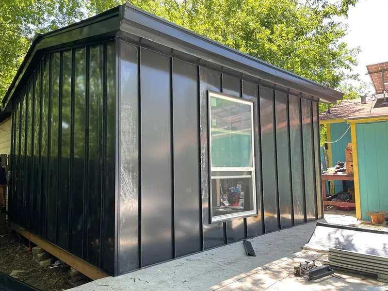 Black standing seam metal wall panels for Metal Roof Installation in Antigo